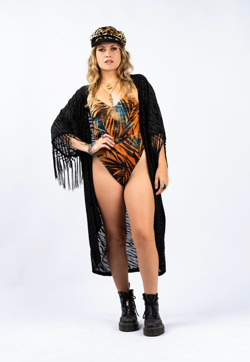 Outfit, fashion, festival fashion, animal print, matching set, maxi skirt, top, designer clothing, fashion trends, cheetah print skirt, designer clothing, festival outfit, festival wear, rave wear, festival clothing, festival kimono, festival robe, resort wear, lounge wear, animal print jacket, animal print pants, festival robe, resort wear, lounge wear, animal print jacket, animal print pants, kimono jacket, festival jacket, tropical jacket, velvet jacket, festival set, festival kaftan, boho kaftan