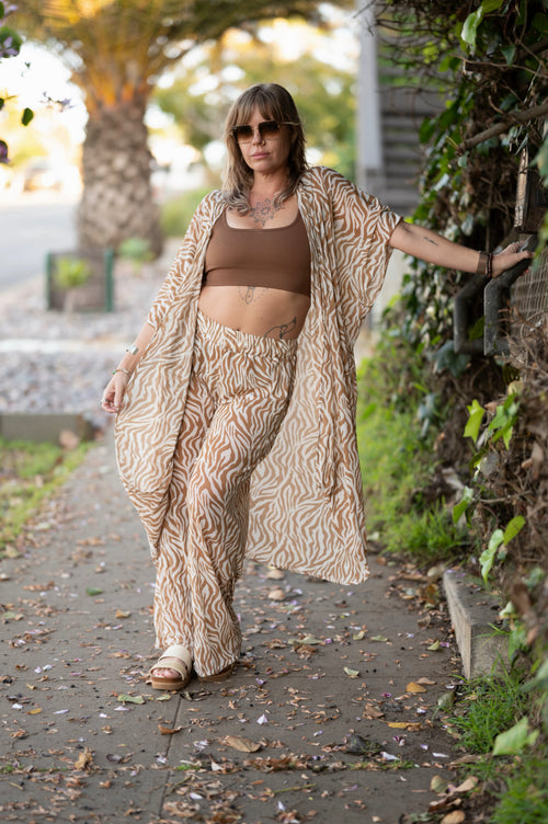 festival outfit, festival clothing, festival kimono, resort wear, animal print outfit, matching animal print set, tiger print kimono, tiger print robe, animal print robe, animal print pants, festival robe, festival wear, flowy pants, animal print kimono, tiger print pants, flowy kimono, yacht wear, cream outfit, cream, pants, nude pants, 