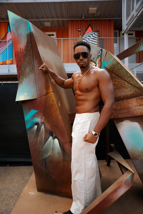 festival clothing, festival outfit, rave wear, resort wear, all natural, linen pants, snakeskin pants, cream pants, wide leg pants, festival brand, eco friendly, all natural