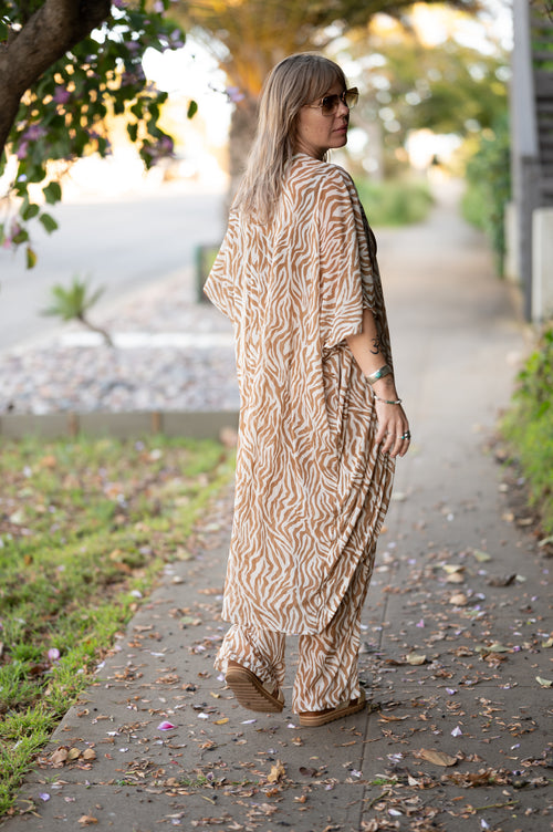 festival outfit, festival clothing, festival kimono, resort wear, animal print outfit, matching animal print set, tiger print kimono, tiger print robe, animal print robe, animal print pants, festival robe, festival wear, flowy pants, animal print kimono, tiger print pants, flowy kimono, yacht wear, cream outfit, cream, pants, nude pants, festival fashion